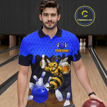 Load image into Gallery viewer, Male model wearing the Black and Blue Funny Bee Beer Bowling polo shirt with funny bee, beer mug and blue hexagon graphics, front view