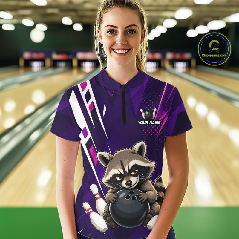 Woman wearing custom purple funny raccoon bowling team jersey quarter zip shirt featuring funny raccoon bowling artwork, front view.