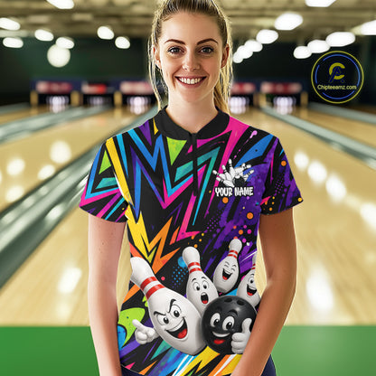 Woman wearing funny colorful bowling ball bowling team jersey quarter zip shirt featuring colorful bowling ball artwork, front view.