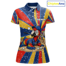 Load image into Gallery viewer, Women's golf polo mockup featuring vibrant grunge parrot artwork, custom golf shirt for women's golf teams, country clubs and tropical golf vacations. Themes: creativity, optimism and adventure.