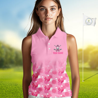 Woman wearing a pink sleeveless golf shirt with a floral pattern on a golf course.
