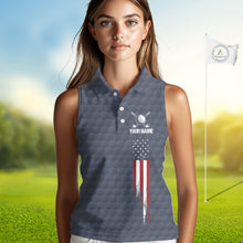 Load image into Gallery viewer, Female golfer wearing custom patriotic golf polo with grey golf ball pattern, perfect for ladies golf league, Memorial Day tournaments, Independence Day golf outings, symbolizing freedom, confidence and teamwork.