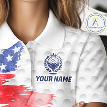 Load image into Gallery viewer, Female golfer wearing artistic patriotic golf polo featuring colorful splash golf ball artwork, perfect for women's golf leagues, charity tournaments and Independence Day celebrations.