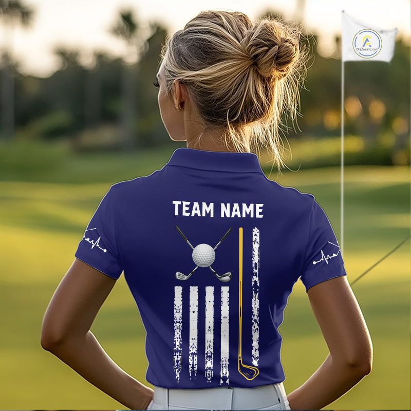 Female golfer wearing yellow blue grunge American flag golf polo shirt, patriotic golf clothing, golf tournament outfit