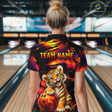 Load image into Gallery viewer, Female bowler wearing tiger fire bowling jersey during league competition, personalized bowling apparel symbolizing power, resilience and competitive spirit.