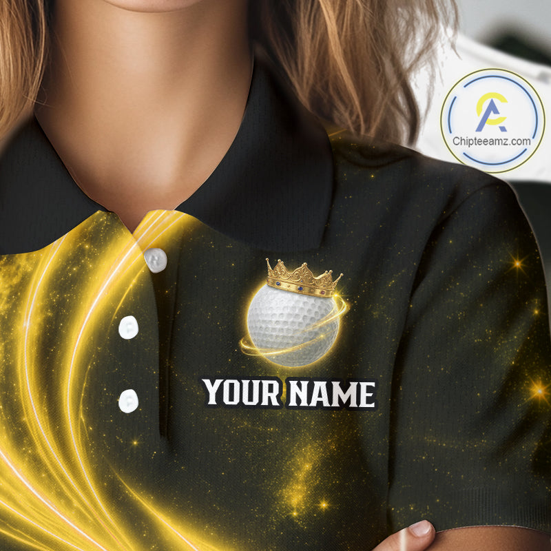 Female golfer wearing galaxy yellow crown golf ball polo shirt, women's golf apparel, tournament golf outfit