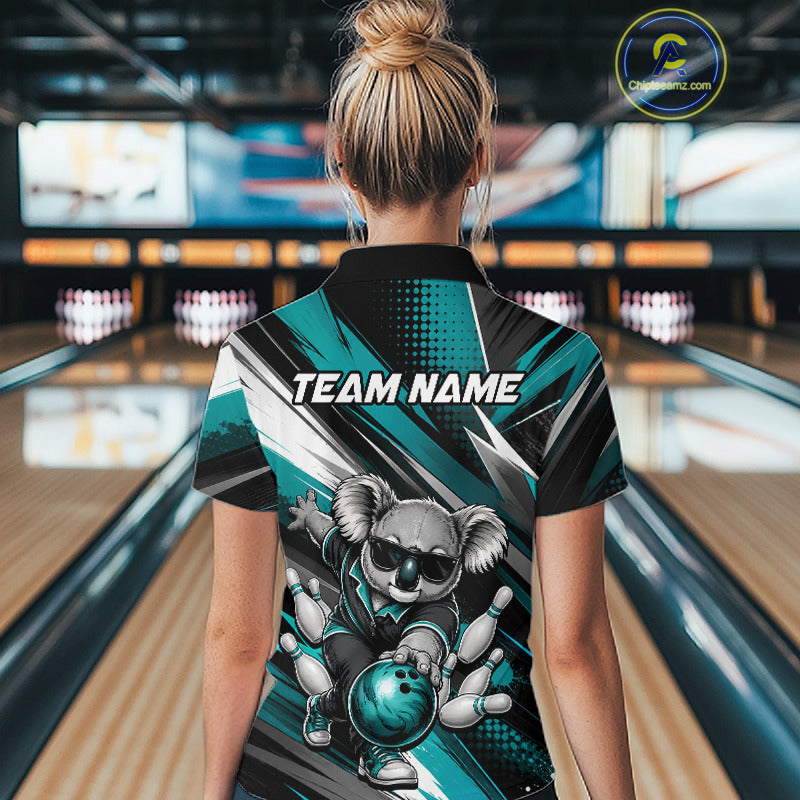 Female bowler posing in a modern bowling alley wearing Grunge Turquoise Bear jersey, personalized bowling apparel, bear symbolizes courage, determination, teamwork, family fun, outdoor adventure, competitive spirit, custom sportswear.
