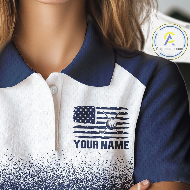 Female golfer wearing patriotic US flag golf sleeveless polo shirt, red white and blue golf apparel, women's golf tournament outfit