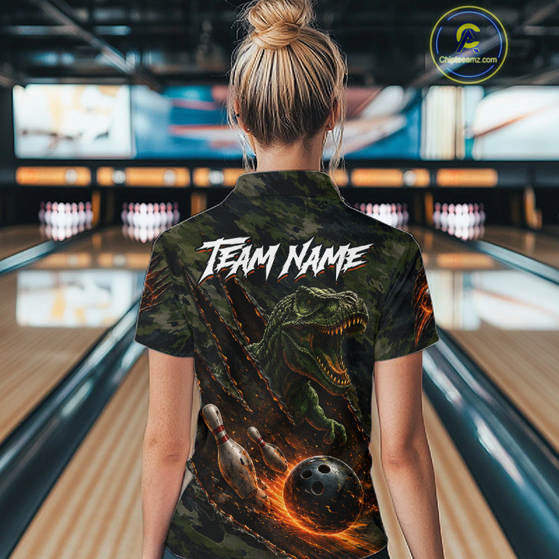 Female bowler wearing green camo dinosaur bowling polo during league competition, personalized bowling apparel, retro bowling fashion, bowling club uniform