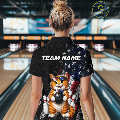 Women wearing a bowling shirt with a cat american flag design and 'TEAM NAME' text in a bowling alley.