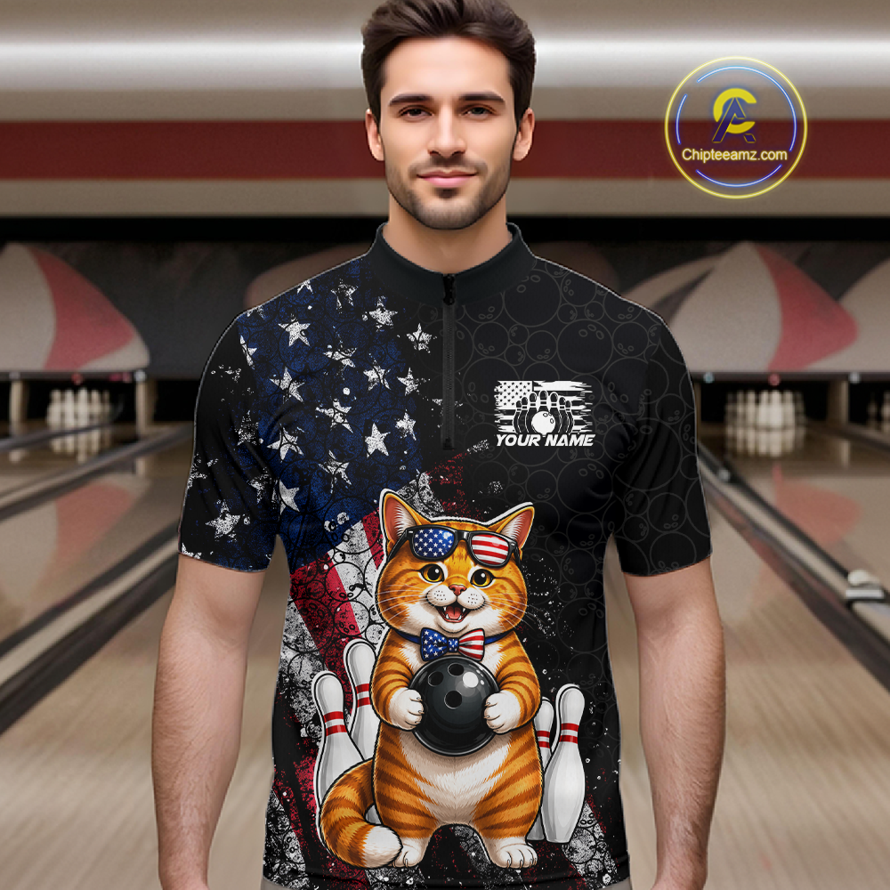 Man wearing a bowling shirt with a cat design in a bowling alley