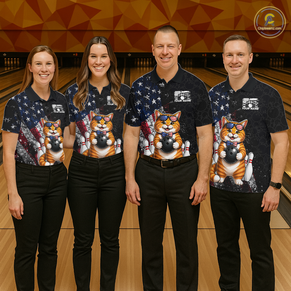 Four people wearing matching shirts with a cat american flag design on a bowling alley.
